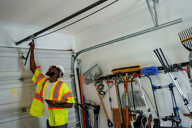 Professional Garage Door Panel Replacement technician working in North Babylon, NY
